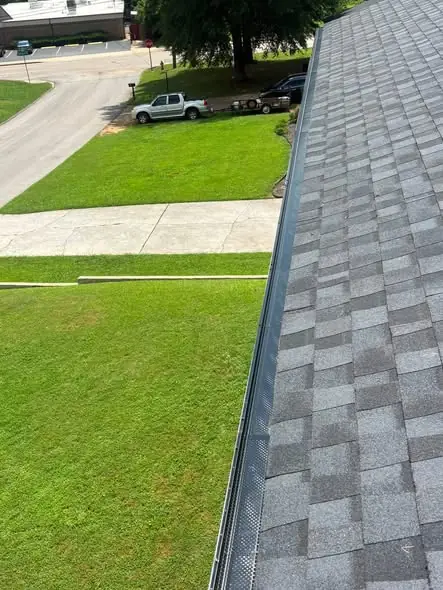 316 stainless micro-mesh gutter guard on a K-style run